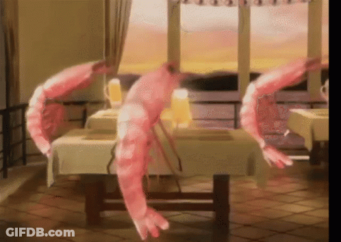 Two Pink Shrimp Sitting On Table GIF