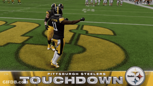 Two Pittsburgh Steelers Players Standing On Field GIF