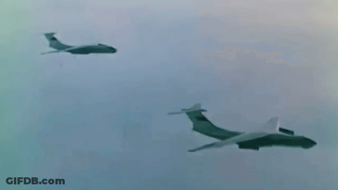 Two Planes Flying Towards Each Other GIF