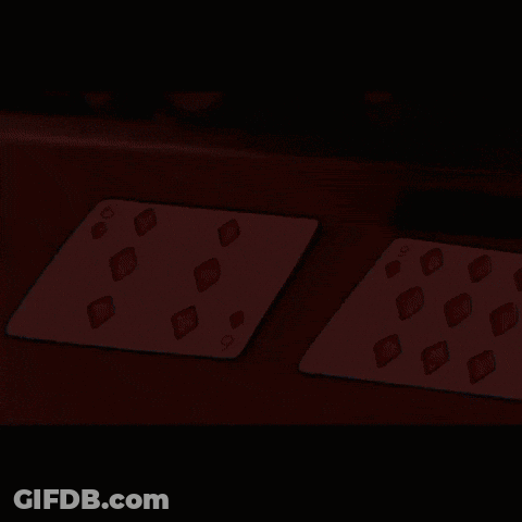 Two Playing Cards On Table GIF