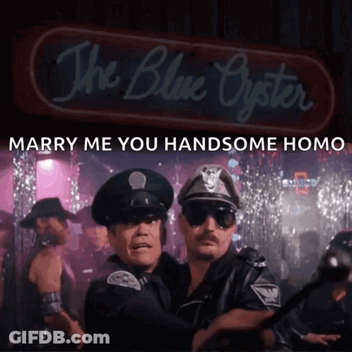 Two Police Officers Are Dancing In Front Of A Sign That Says The Blue Oyster GIF