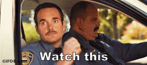 Two Police Officers Are Sitting In A Car With The Words Watch This Written On The Bottom . GIF