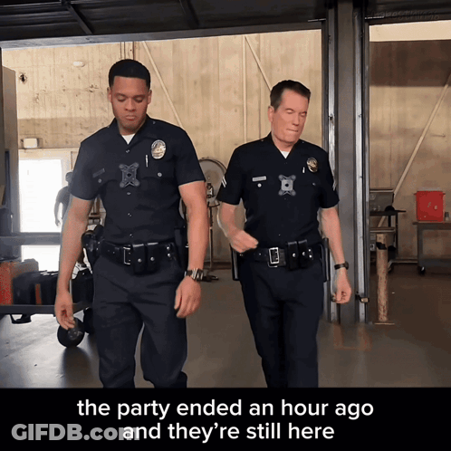 Two Police Officers Walking In Garage Saying The Party Ended An Hour Ago And They're Still Here GIF