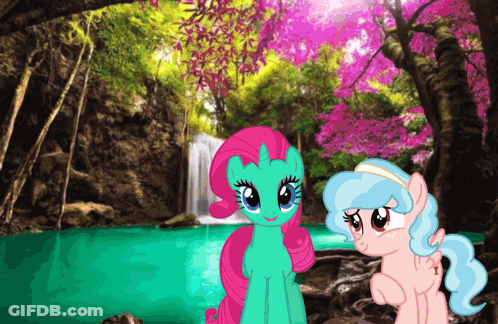 Two Ponies Are Standing In Front Of A Waterfall In The Woods GIF