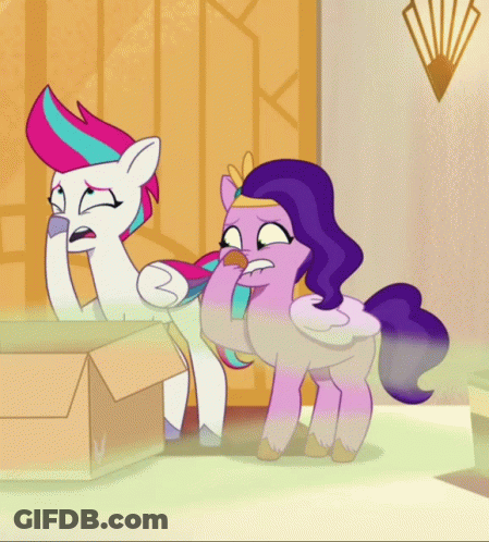Two Ponies One Wearing Crown GIF