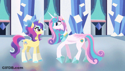 Two Ponies Standing With Star On Tail GIF