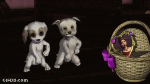 Two Puppies Are Dancing Next To A Basket With A Picture Of A Woman On It . GIF