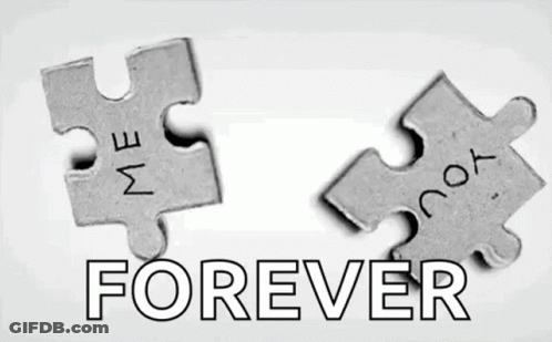 Two Puzzle Pieces With The Words Me And You Engraved On Them GIF