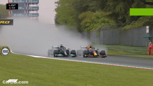 Two Race Cars On Track With Number 100 GIF