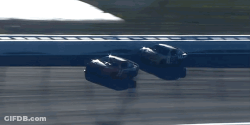 Two Race Cars Racing Number 14 GIF