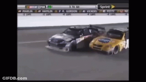 Two Race Cars Racing On Track Saying Sprint GIF