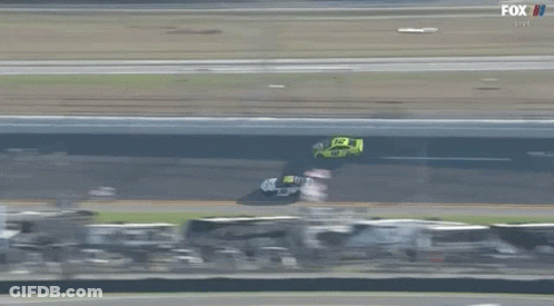 Two Race Cars Racing With Fox Live Logo GIF