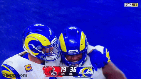 Two Rams Players Hugging GIF