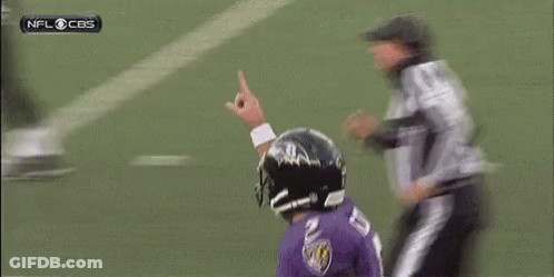 Two Ravens Football Players Running On Field GIF