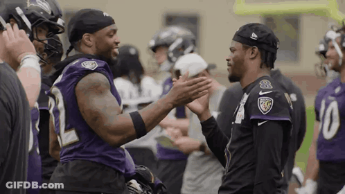 Two Ravens Players High Five GIF