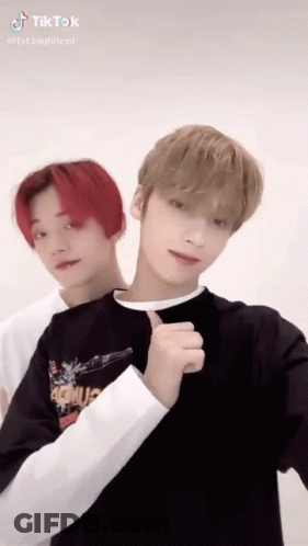 Two Red-Haired Boys Posing GIF