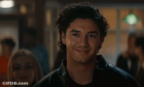 Two Red Hearts With Boy And Kiss GIF