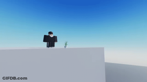 Two Roblox Characters Are Standing On Top Of A White Block GIF