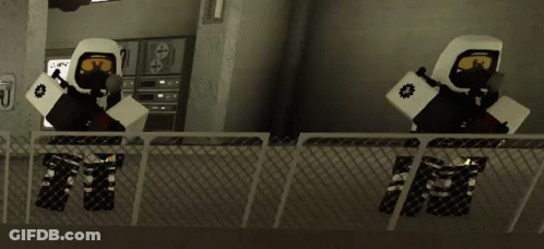 Two Robotic Soldiers Standing On Balcony In Video Game GIF