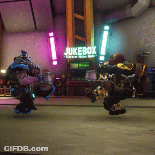 Two Robots Are Dancing In Front Of A Jukebox That Says " Discover Hidden Gems " GIF