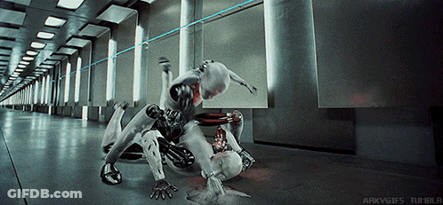 Two Robots Are Fighting In A Hallway With The Words Arkvgifs Tumblr Visible GIF