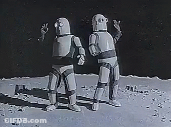 Two Robots Are Standing Next To Each Other On The Moon And Talking To Each Other . GIF