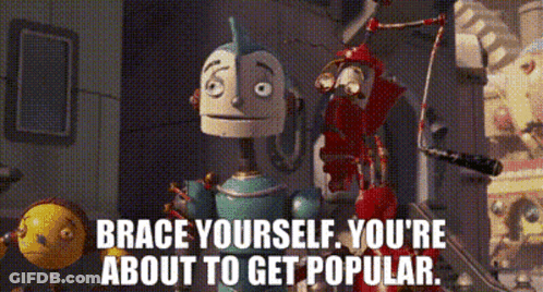 Two Robots Are Standing Next To Each Other With The Words Brace Yourself You 'Re About To Get Popular GIF
