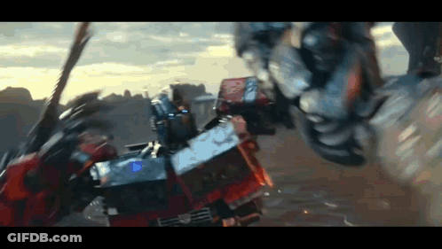 Two Robots Fighting One With Blue Light GIF