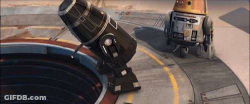 Two Robots One With Letter O GIF