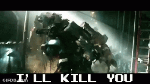 Two Robots Standing Together With Letter O On Head GIF