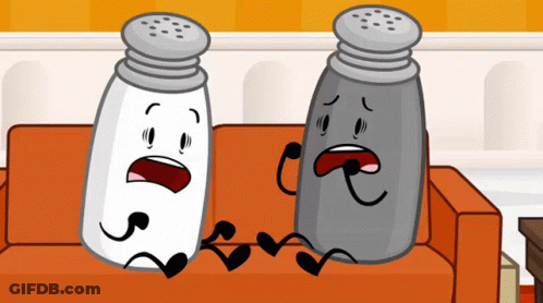 Two Salt And Pepper Shakers Are Sitting On A Couch With Their Mouths Open GIF