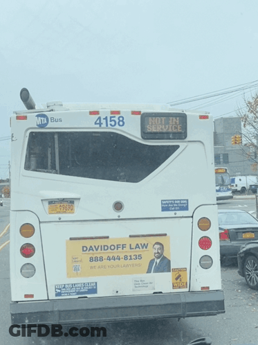 Two School Buses Parked Together With Foundation Logo GIF