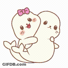 Two Seals Hugging With Heart Above GIF