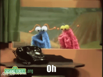 Two Sesame Street Characters Are Looking Out A Window With A Phone On A Table GIF