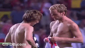 Two Shirtless Men GIF