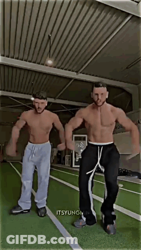 Two Shirtless Men Are Dancing In A Gym And The Caption Says Itsyungi GIF
