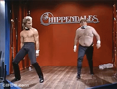 Two Shirtless Men Are Dancing In Front Of A Sign That Says Chippendale 'S GIF