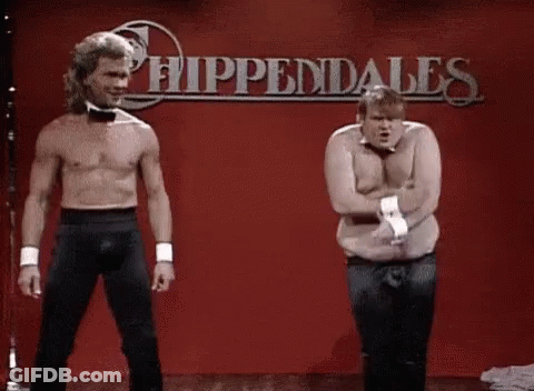Two Shirtless Men Are Dancing On A Stage In Front Of A Sign That Says Hippendales . GIF