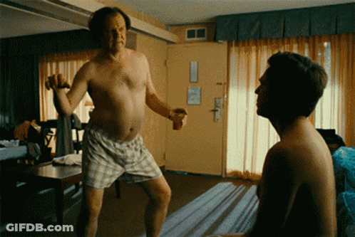 Two Shirtless Men Dancing GIF