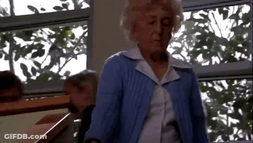 Two Shirtless Men Standing In A Room GIF