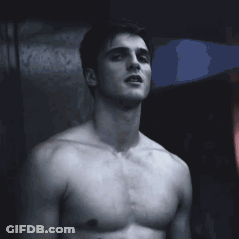 Two Shirtless Men Standing In A Room GIF