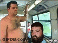 Two Shirtless Men Standing On Bus GIF