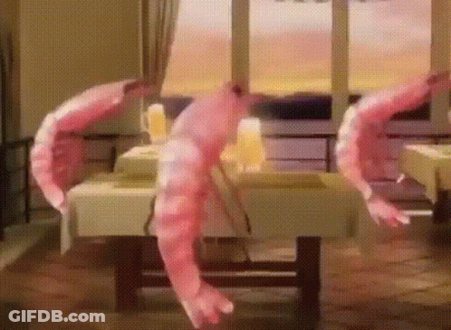Two Shrimp Hanging From Restaurant Window GIF