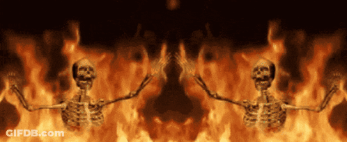 Two Skeletons Dancing By Fire GIF