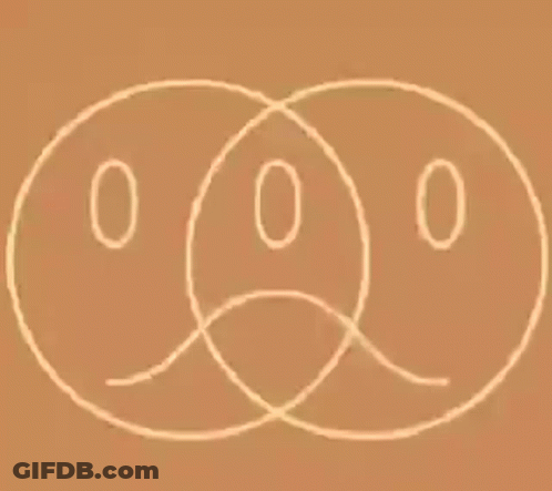 Two Smiley Face Circles On Brown Background GIF