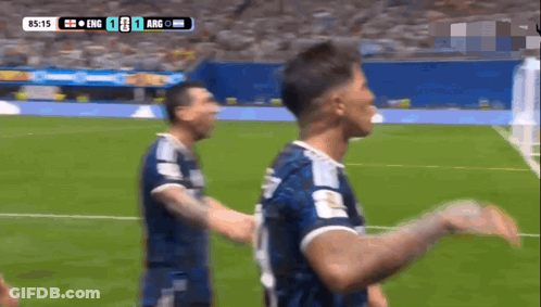 Two Soccer Players Are Celebrating A Goal During A Game Between England And Argentina GIF