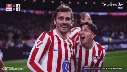 Two Soccer Players Are Celebrating A Goal During A Game Sponsored By Coupang GIF
