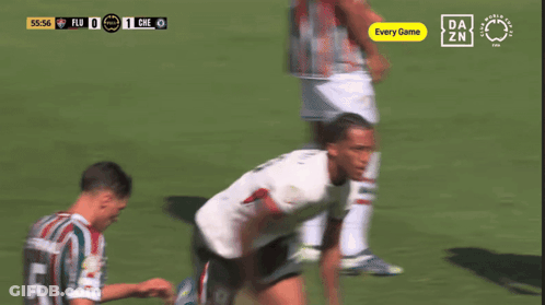 Two Soccer Players Are Celebrating A Goal With A Free Da Zn Logo In The Background GIF