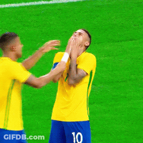 Two Soccer Players Are Hugging And One Has The Name Rafael On The Back Of His Jersey GIF