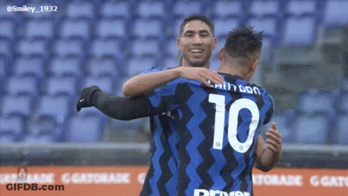 Two Soccer Players Are Hugging And One Has The Number 10 On His Shirt GIF